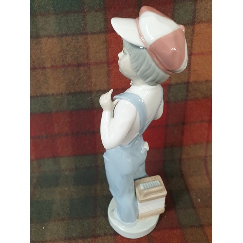 139 - Lladro Boy With Bib and Brace Dungarees Hat And Accordion At His Feet 23 cms Tall