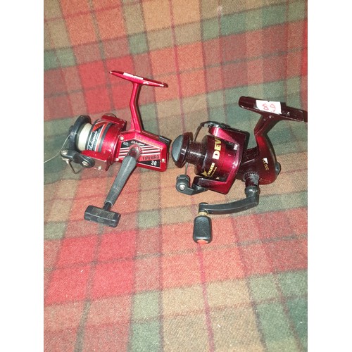 89 - Shakespeare Spinning Reel With Line And Brand New Jarvis Walker Spinning Reel