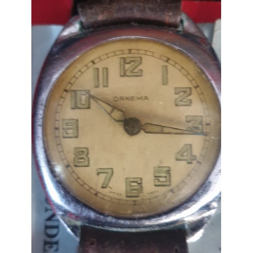 40C - German Vintage Wrist Watch With Swastica Emblem Winds And Ticks No Maker Visible and Vintage Ornema ... 