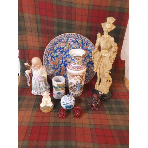 199 - A Selection Of Oriental collectables; Japanese Geisha woman figure, Chinese vase, buddha figures & o... 