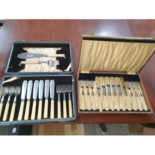 106 - 2 vintage Canteens Of Cutlery [Handles Tested]