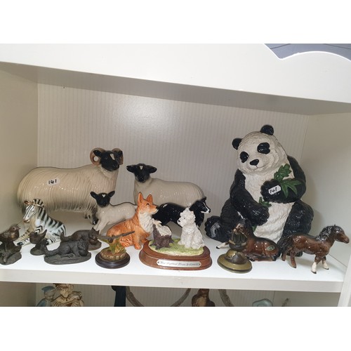 141 - A collection Of Animals Beswick Foals, Large Panda, Sheep & Zebra etc