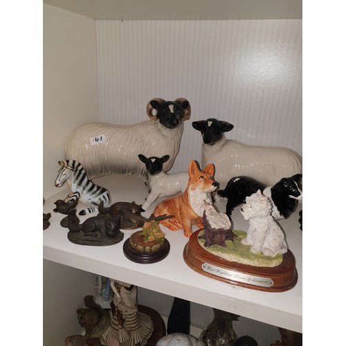 141 - A collection Of Animals Beswick Foals, Large Panda, Sheep & Zebra etc