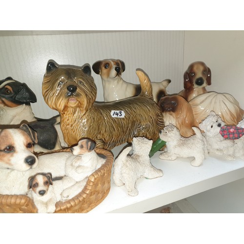 143 - A Shelf Of Assorted Dog Figures etc