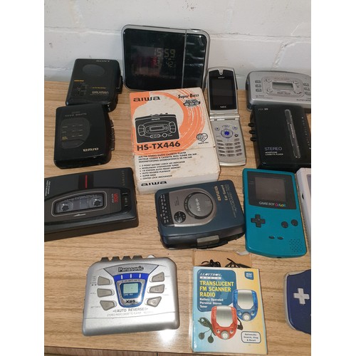 155 - A Box Of Mobile Phones, Cassette Players, Nintendo Game Boys & other items