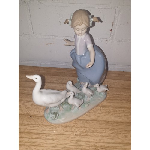 110 - A Large Lladro Figure Group Tending The Ducks