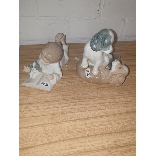 112 - 2 Nao Figures Boy With Puppy And 2 Large Puppies