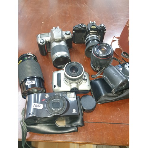 160 - Shelf Of Cameras  Nikon, Minolta Konica, And Kodak Brownie Cine Camera