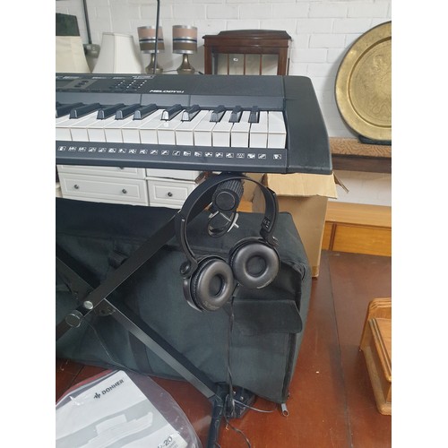 187 - Alesis Keyboard With Stand Ear Phones And Microphone, With Carry Bag etc