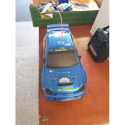 191 - Subaru Hand Built Remote Control Car With  Remote Lots Spare Parts Complete With Magazines
