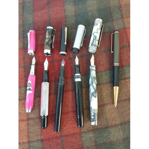 36 - A collection of five vintage pens;  Nib Pens & Ball Point Pen