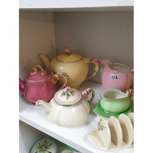 112 - Shelf Of Deco Style China Tea Pots, Toast Racks Cruets etc