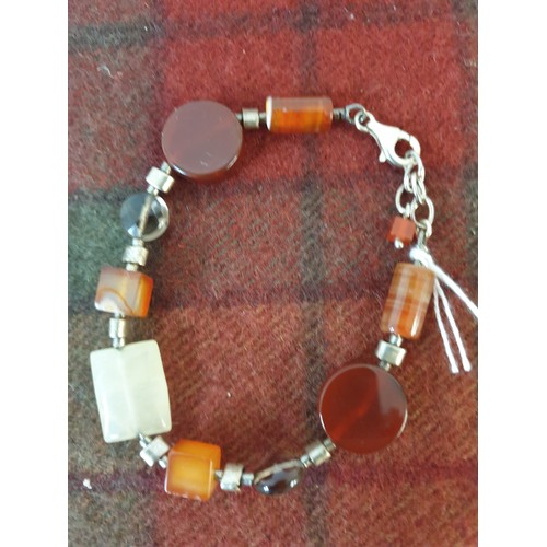 25 - A Silver And Agate setting  Bracelet