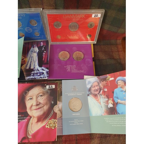 22 - A collection Of Mint Coins; Queen mother pin, Swenska Mynt coin set & Danish coins set etc