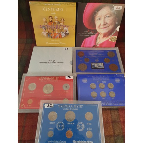 22 - A collection Of Mint Coins; Queen mother pin, Swenska Mynt coin set & Danish coins set etc