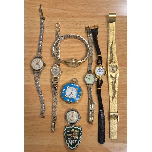 66 - A Colelction of antique & Vintage Ladies wrist watches together with Silver sheild badge