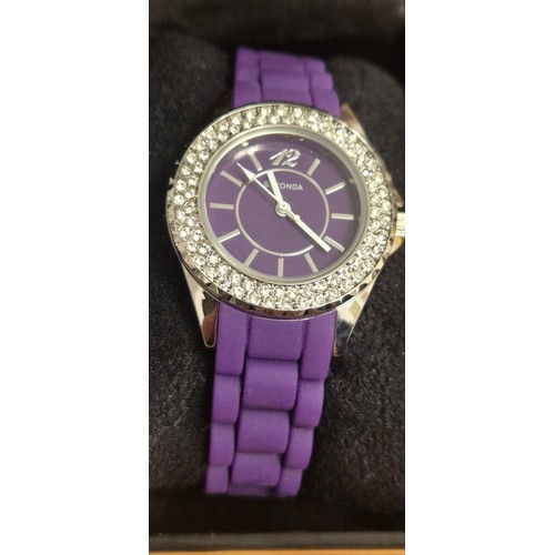 36 - A Sekonda Ladies & Gents watches; Gents 50 metre watch & Ladies purple Sekonda sports watch