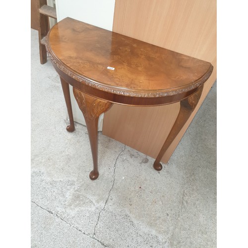 340 - Nice Clean Burr Walnut Top Demi Lune Table With Carvings To Top Of Queen Anne Legs