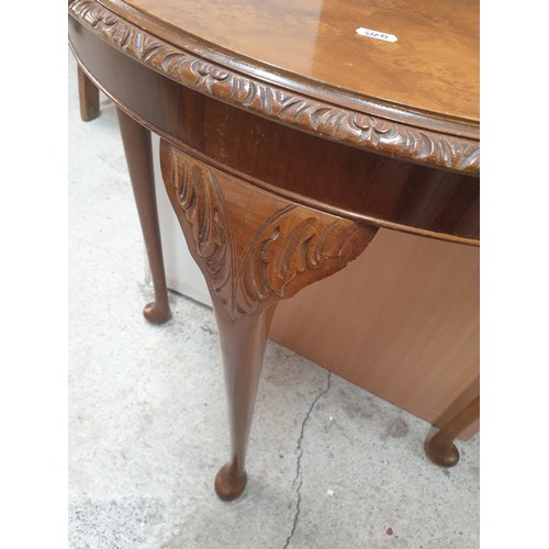 340 - Nice Clean Burr Walnut Top Demi Lune Table With Carvings To Top Of Queen Anne Legs