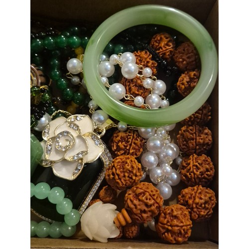 45 - Box of Oriental jewellery. Amulets necklaces, Jade Chinese hardstone bangle & chinese carved bracele... 