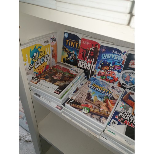 152 - Shelf Of Nintendo Wii Games; Sega Bass Fishing, Tin Tin, Movie Studios & many more.