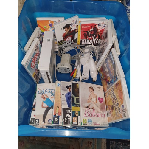 153 - Nintendo Wii Console With Accessories And Games; Red Sleeves, Glee, Ballerina, Tiger Woods PGA & man... 