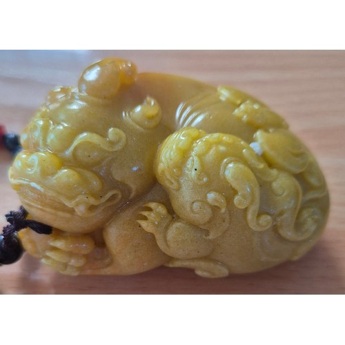 39 - Carved Chinese dog of Wu sculpture.