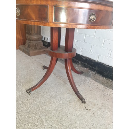 266 - Reproduction Barrel Table With 4 Leg Slayed Feet Leading To Brass Lion Paw Casters.