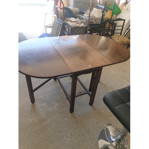 253 - Solid Oak Drop Leaf Dining Table. 92x52cm closed. 92x148cm Open