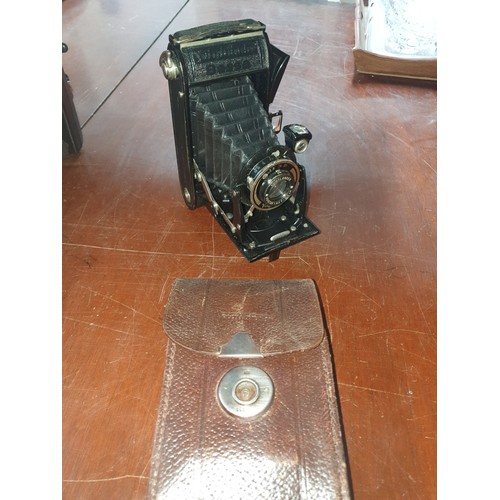147 - Shelf Of Vintage Cameras To Include Voightlander Folding Bellows Camera & others.