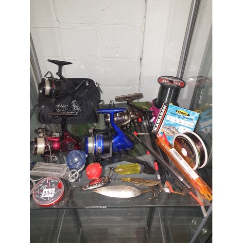 232 - Shelf Of Fishing Tackle Reels, Spools New Line, Lures Split Shots Floats, Bubbles Hooks etc