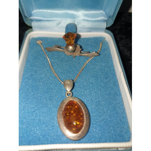 24 - Silver Necklace With Silver And Amber Pendant And Silver Scottish Thistle Brooch With Amber Stone