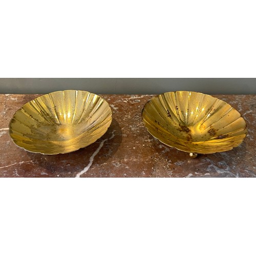 12 - A pair of 6.5 inch Tiffany sterling silver-gilt shell-shaped sweetmeat dishes, each with three ball-... 