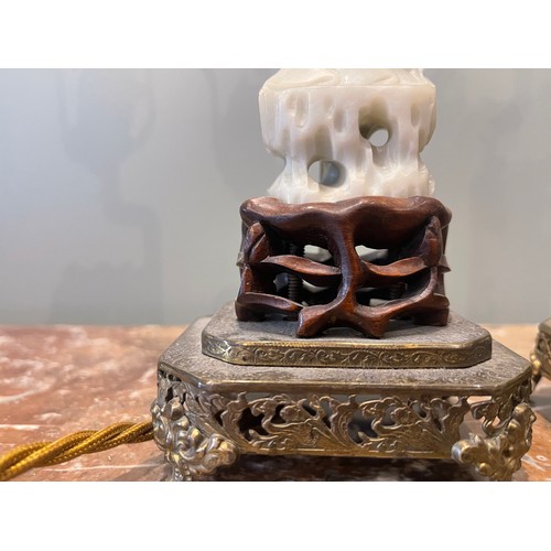 75 - Pair of 19th century Chinese White Jade figures of Lan Ts'ai-ho set upon carved wood bases, set upon... 