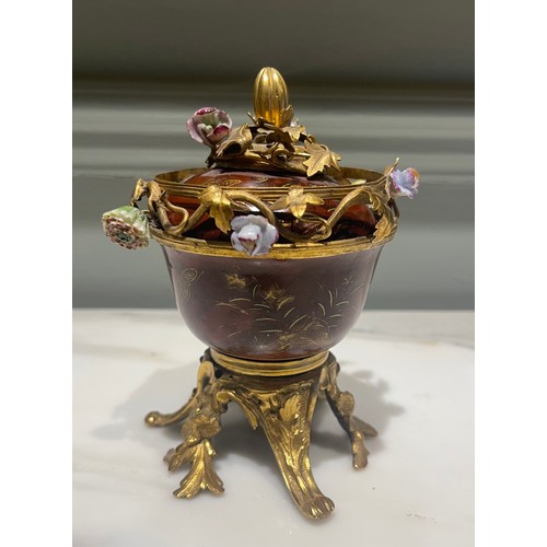 78 - A fine ormolu and scarlet Japanese lacquer potpourri bowl and cover on an ormolu stand of six feet. ... 