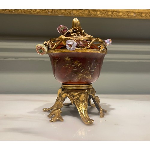 78 - A fine ormolu and scarlet Japanese lacquer potpourri bowl and cover on an ormolu stand of six feet. ... 