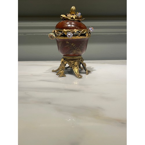 78 - A fine ormolu and scarlet Japanese lacquer potpourri bowl and cover on an ormolu stand of six feet. ... 