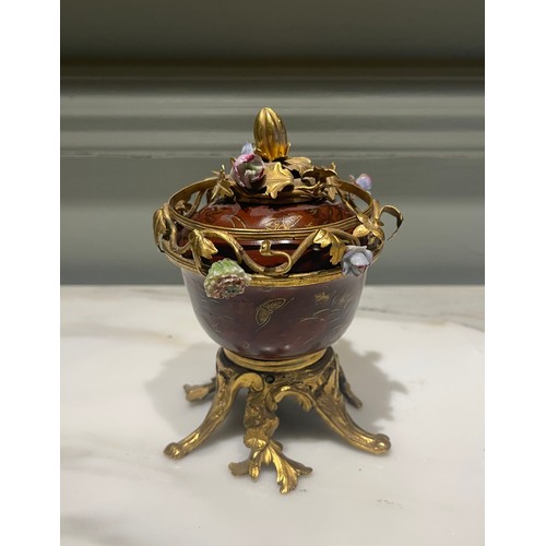 78 - A fine ormolu and scarlet Japanese lacquer potpourri bowl and cover on an ormolu stand of six feet. ... 