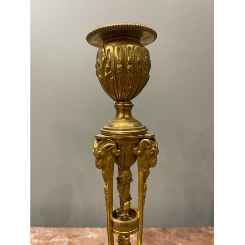 85 - A pair of Restauration ormolu candlesticks (circa 1820). Each with a pierced tripartite and vine-wra... 