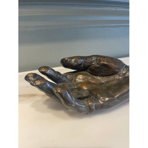 93 - An Old Bronze Hand.22.5 cm (L) x 9 cm (W)