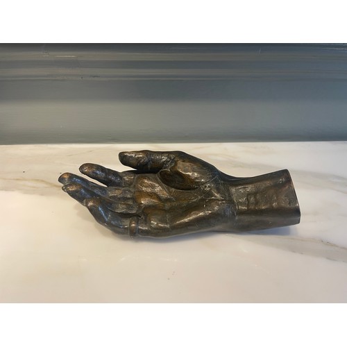 93 - An Old Bronze Hand.22.5 cm (L) x 9 cm (W)