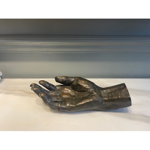 93 - An Old Bronze Hand.22.5 cm (L) x 9 cm (W)