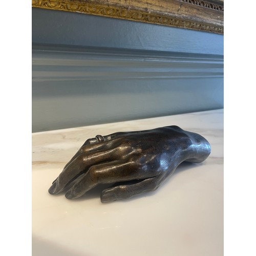 93 - An Old Bronze Hand.22.5 cm (L) x 9 cm (W)