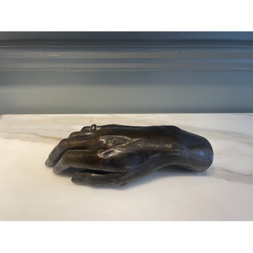 93 - An Old Bronze Hand.22.5 cm (L) x 9 cm (W)