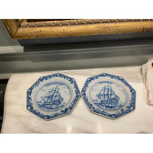 96 - A pair of fine Liverpool Delftware octagonal ship plates. Dated 1761. Painted in blue with a th... 