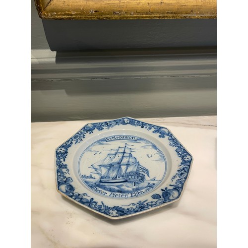 96 - A pair of fine Liverpool Delftware octagonal ship plates. Dated 1761. Painted in blue with a th... 