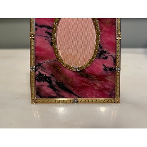 98 - Rhodonite, rose gold and silver photo frame. Alternating gold and silver applied flowers around runn... 