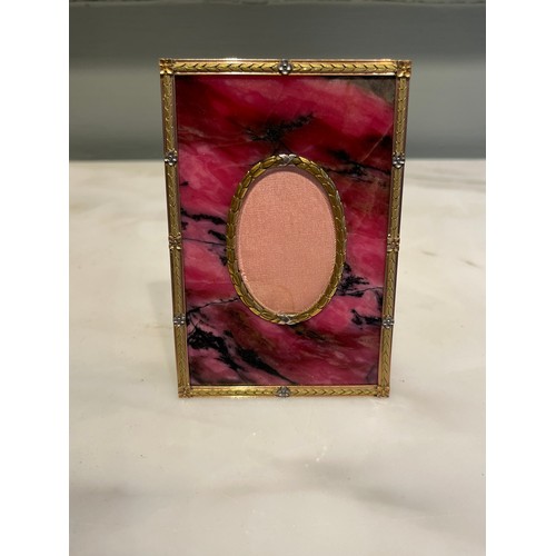 98 - Rhodonite, rose gold and silver photo frame. Alternating gold and silver applied flowers around runn... 