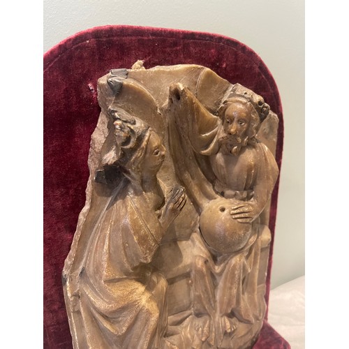 99 - A 15th century Nottingham alabaster panel sculpture. On burgundy velvet stand. Traces of original po... 