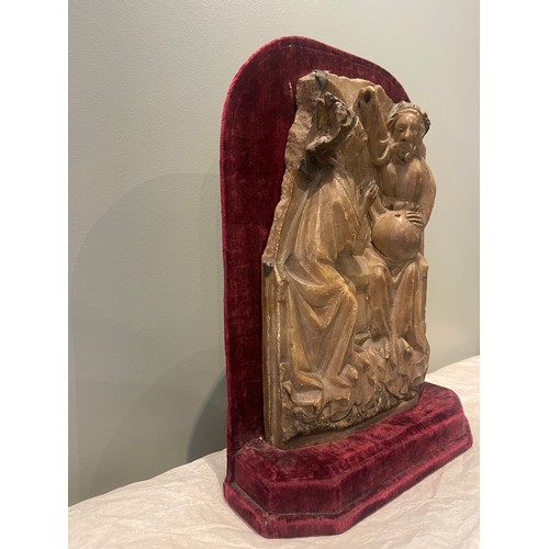 99 - A 15th century Nottingham alabaster panel sculpture. On burgundy velvet stand. Traces of original po... 